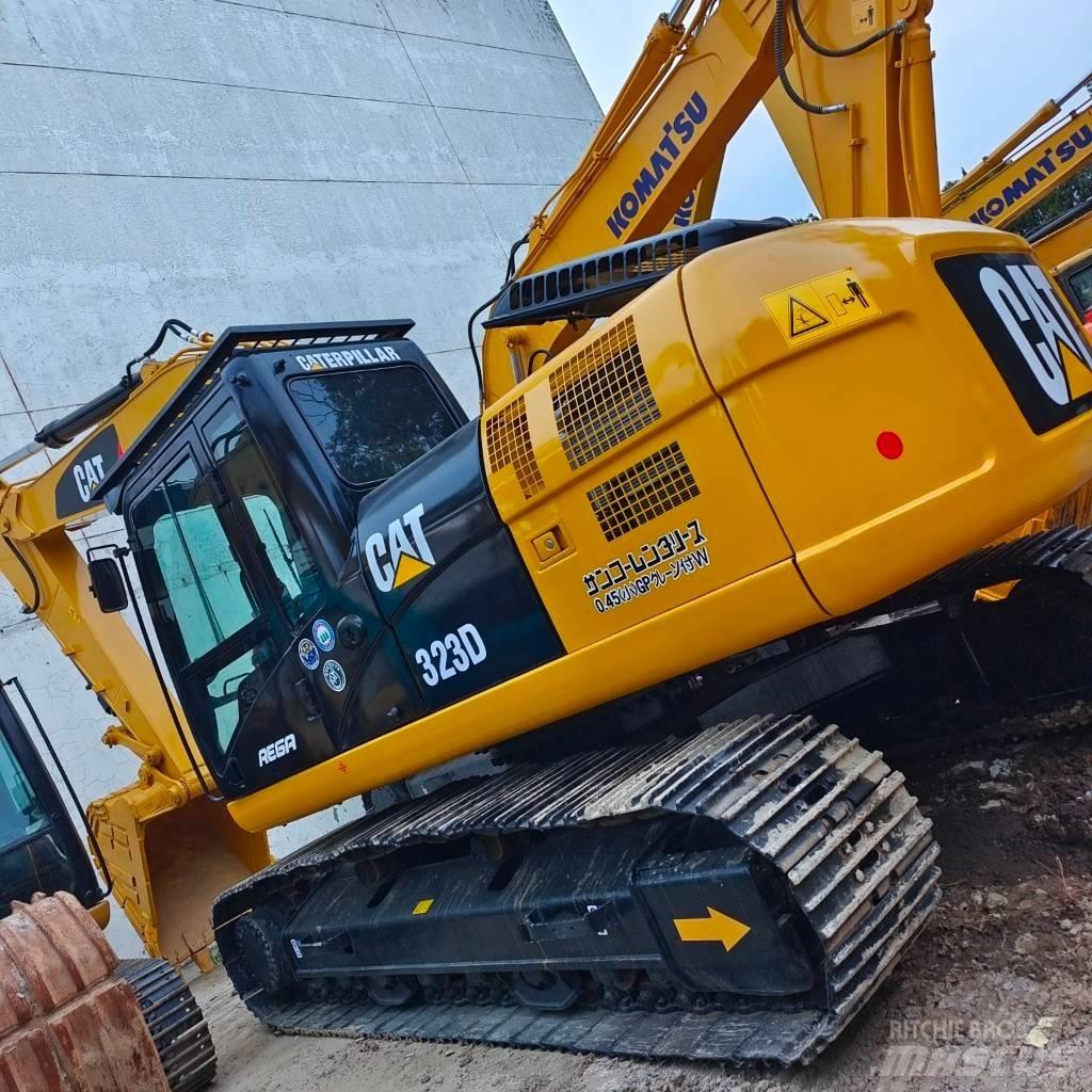 CAT 323 D Pásová rýpadla