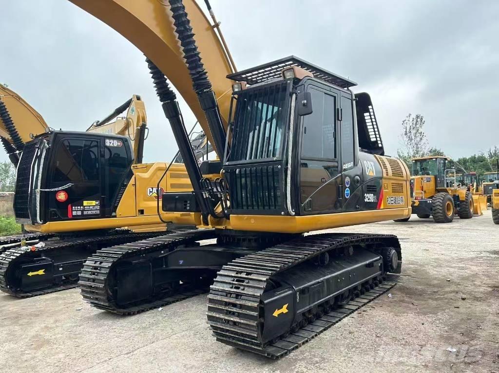 CAT 329 Pásová rýpadla