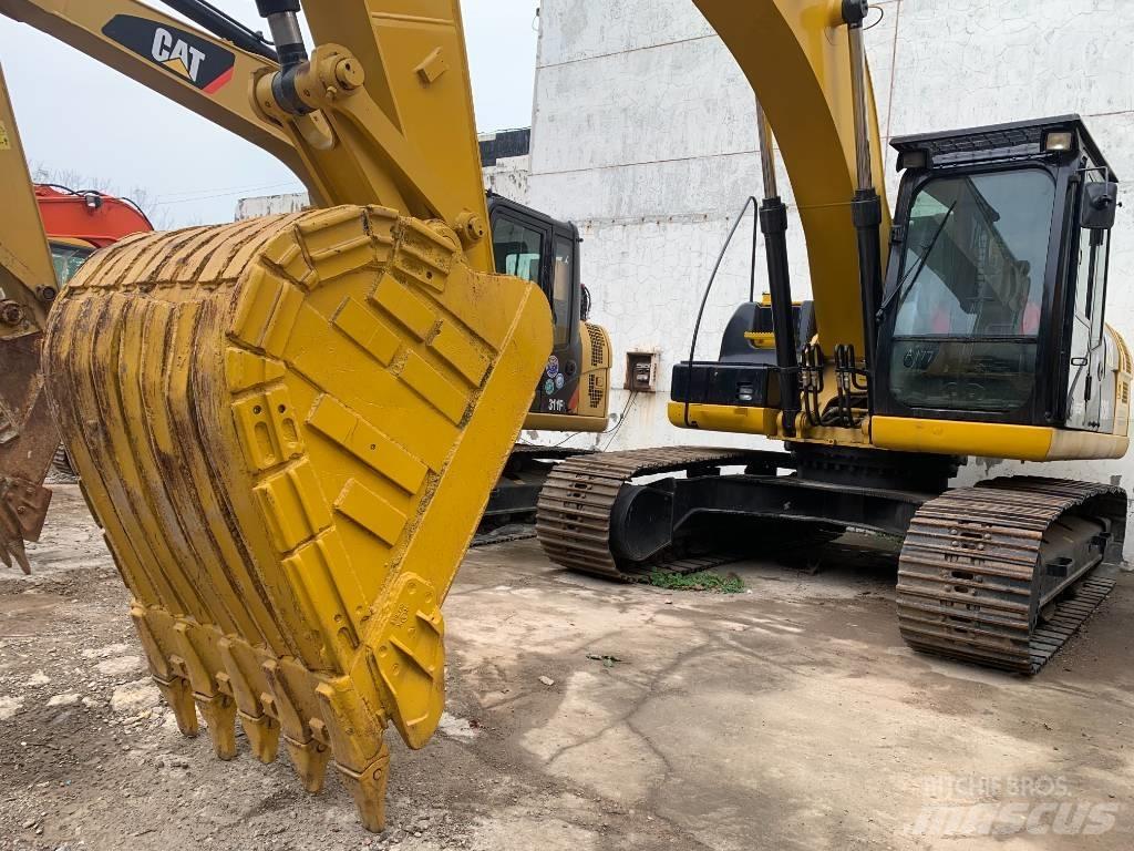 CAT 323 D L Pásová rýpadla