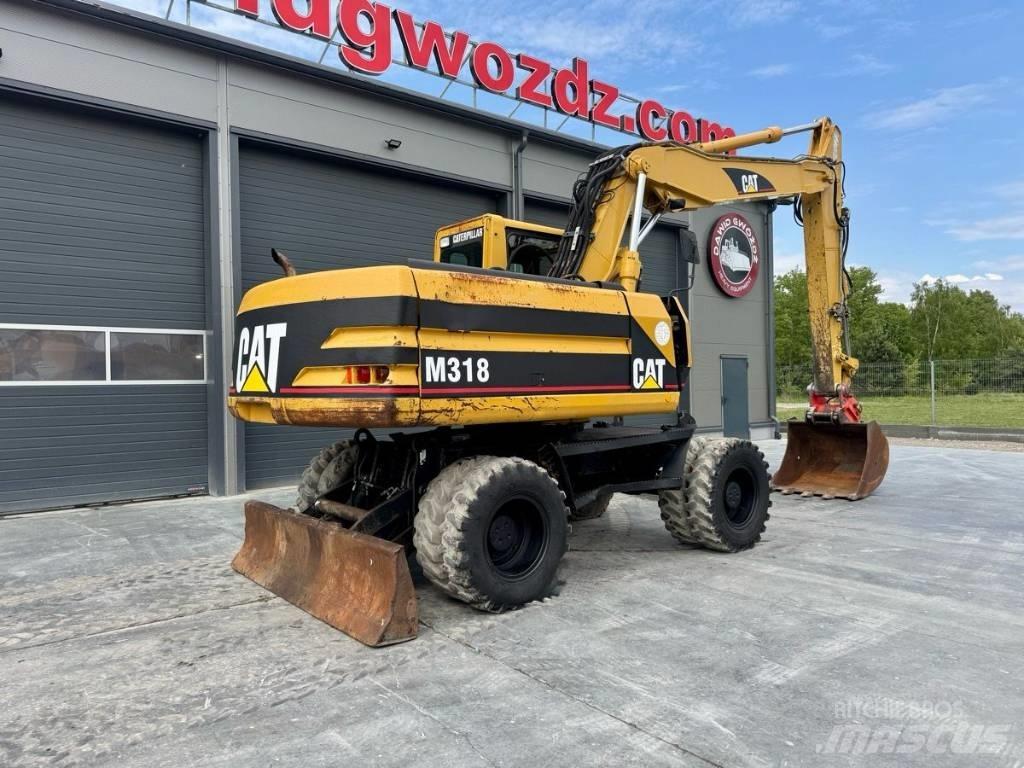 CAT M 318 Kolová rýpadla