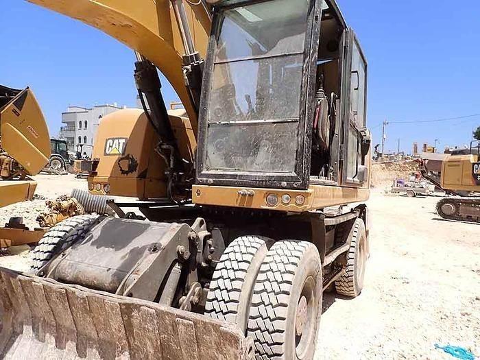 CAT M320F Speciální bagry