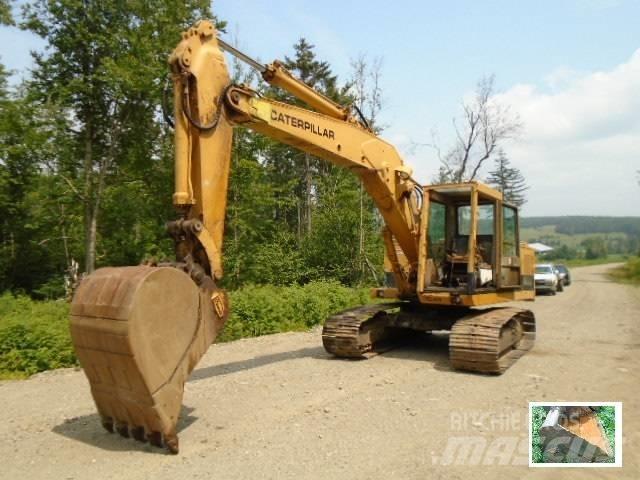 CAT 215 Pásová rýpadla