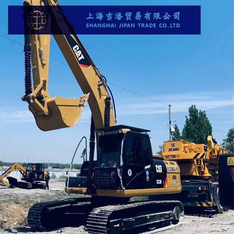 CAT 323 D Pásová rýpadla