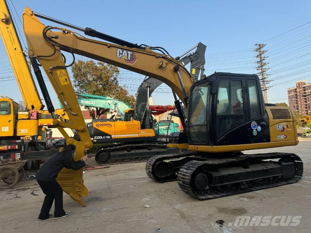 CAT 313 D Pásová rýpadla