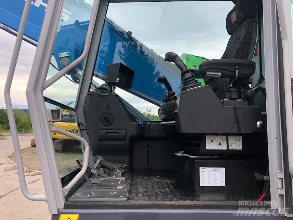 Fuchs MHL320 Stroje pro manipulaci s odpadem