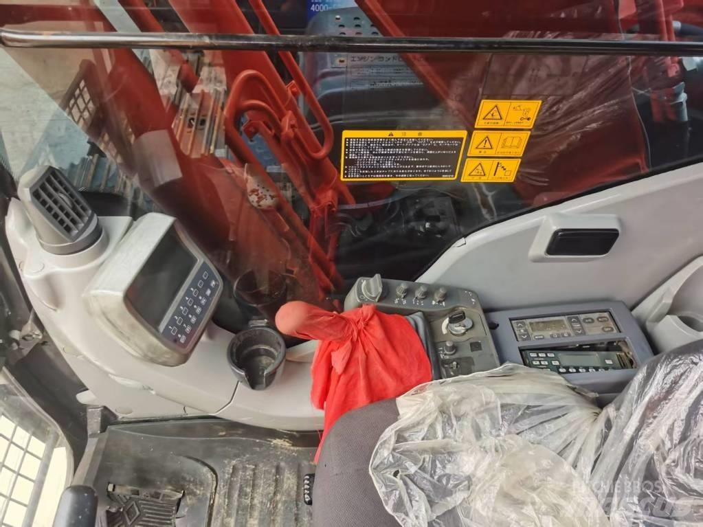 Hitachi ZX 210 Pásová rýpadla