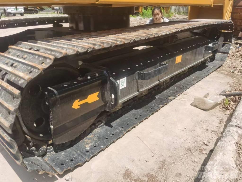CAT 310 Pásová rýpadla