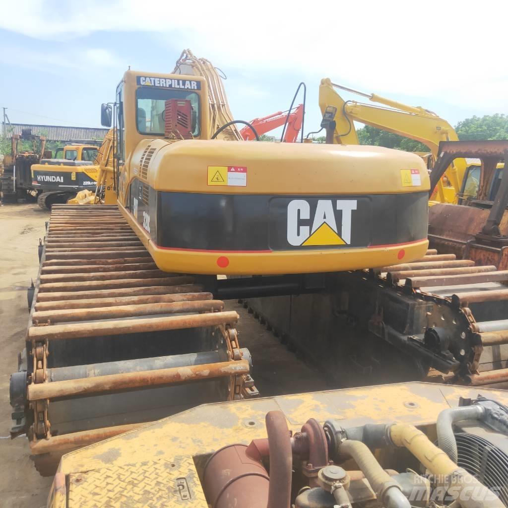 CAT 320C Obojživelná rypadla