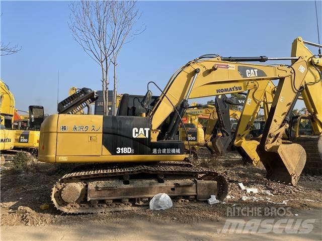 CAT 318D Pásová rýpadla