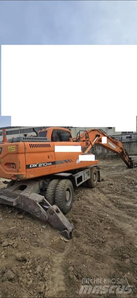 Doosan DX 210 W Kolová rýpadla