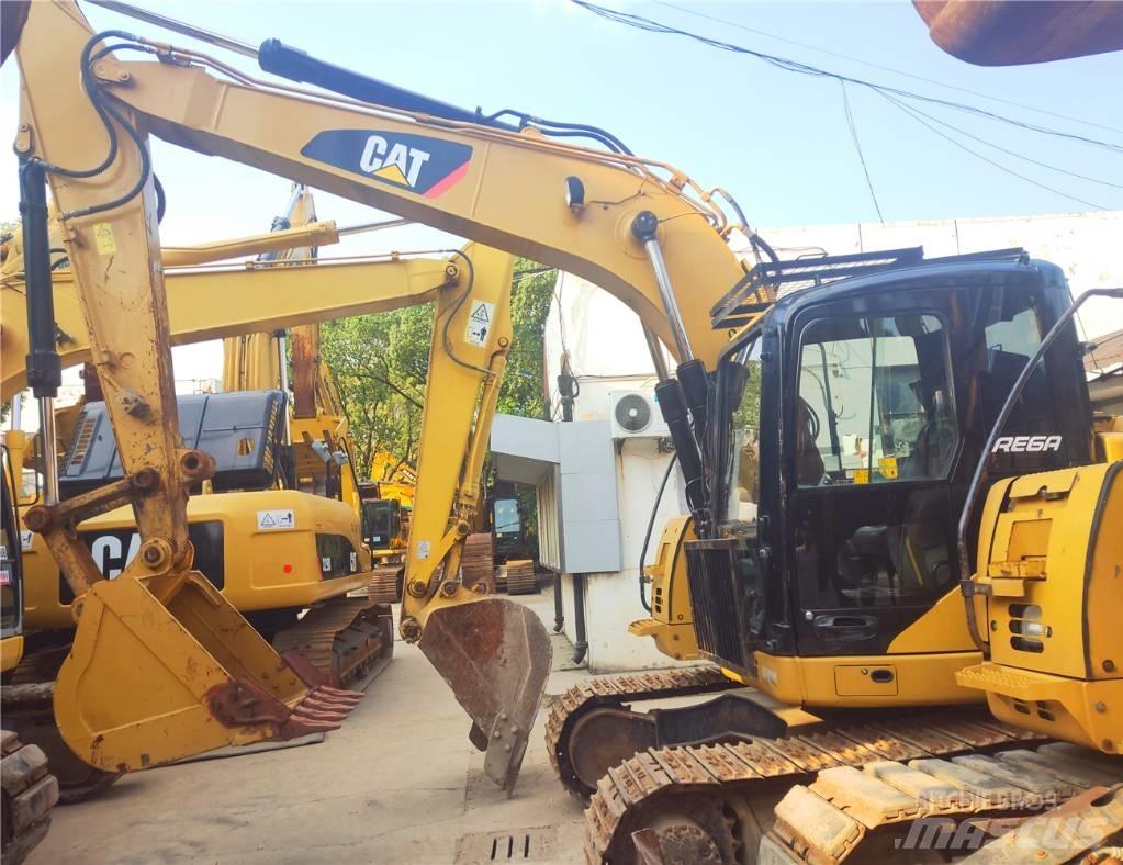 CAT 313 D Pásová rýpadla