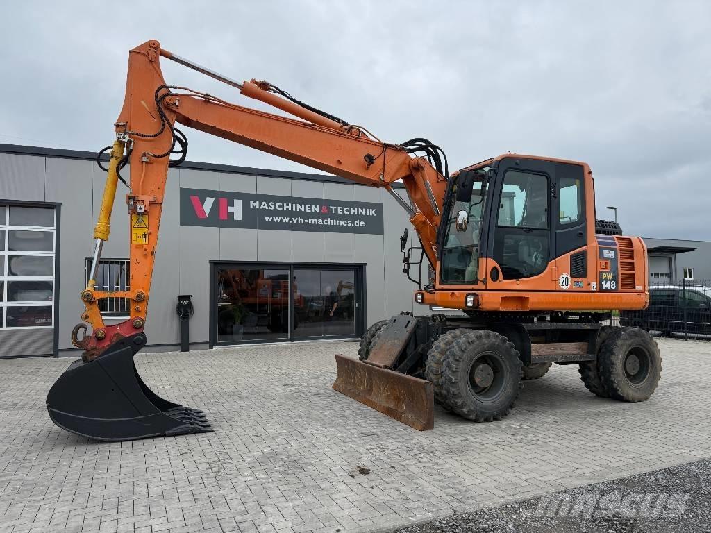 Komatsu PW 148-8 Kolová rýpadla