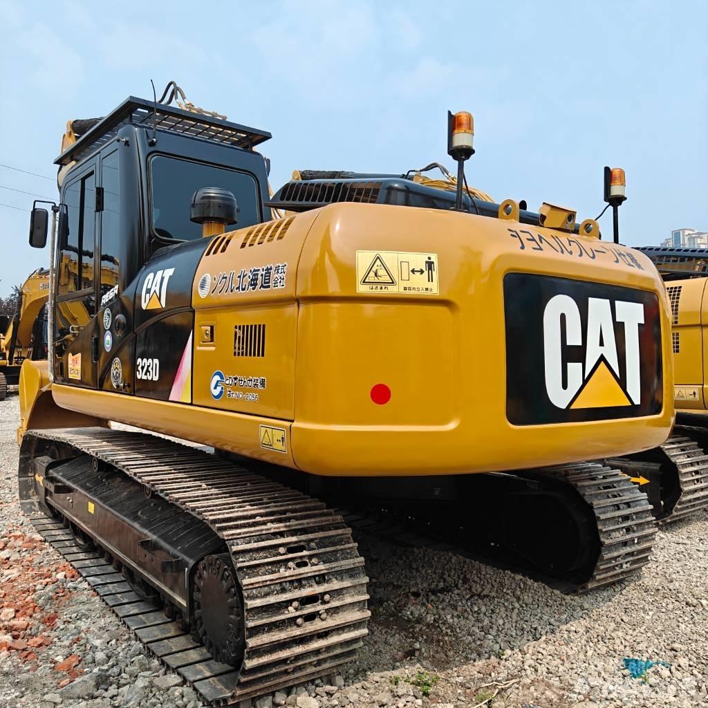 CAT 323D Pásová rýpadla