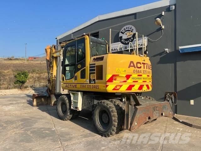 Komatsu PW 148 Kolová rýpadla