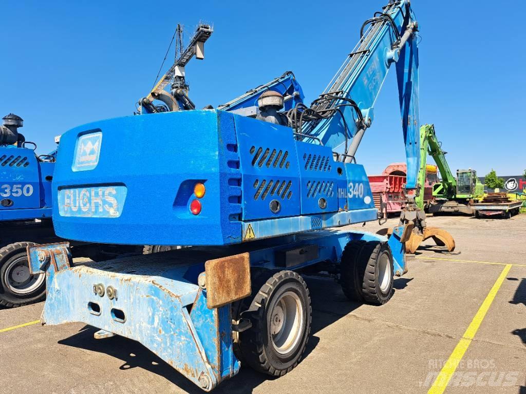 Fuchs MHL340D Stroje pro manipulaci s odpadem