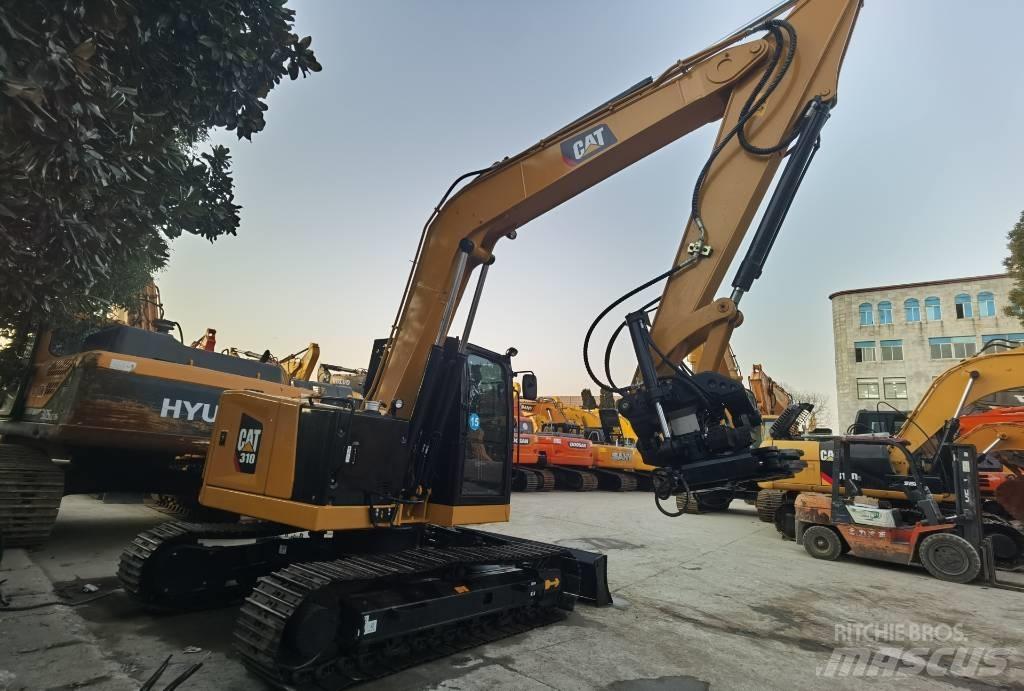 CAT 310 Pásová rýpadla