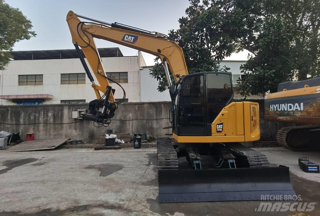 CAT 310 Pásová rýpadla