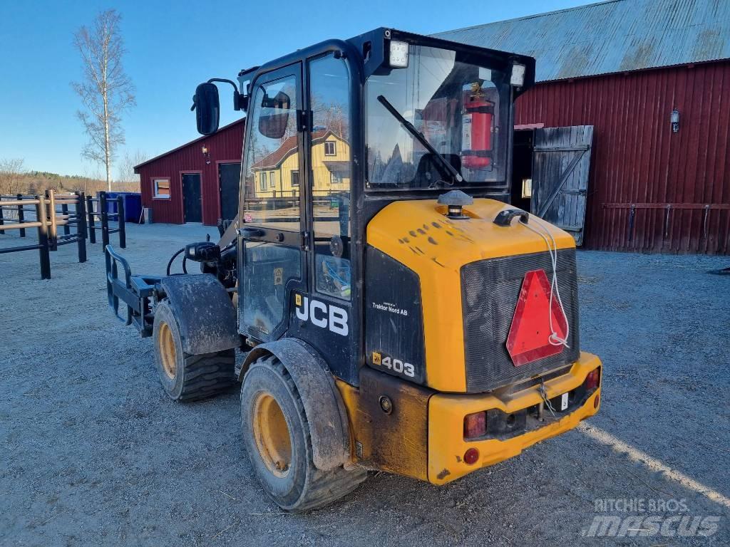 JCB 403 Smykem řízené nakladače