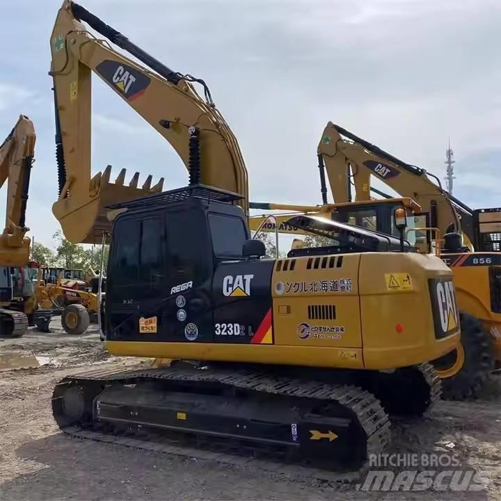 CAT CAT323D2L Midi rýpadla 7t - 12t