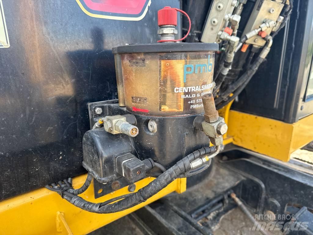 CAT 310 Pásová rýpadla
