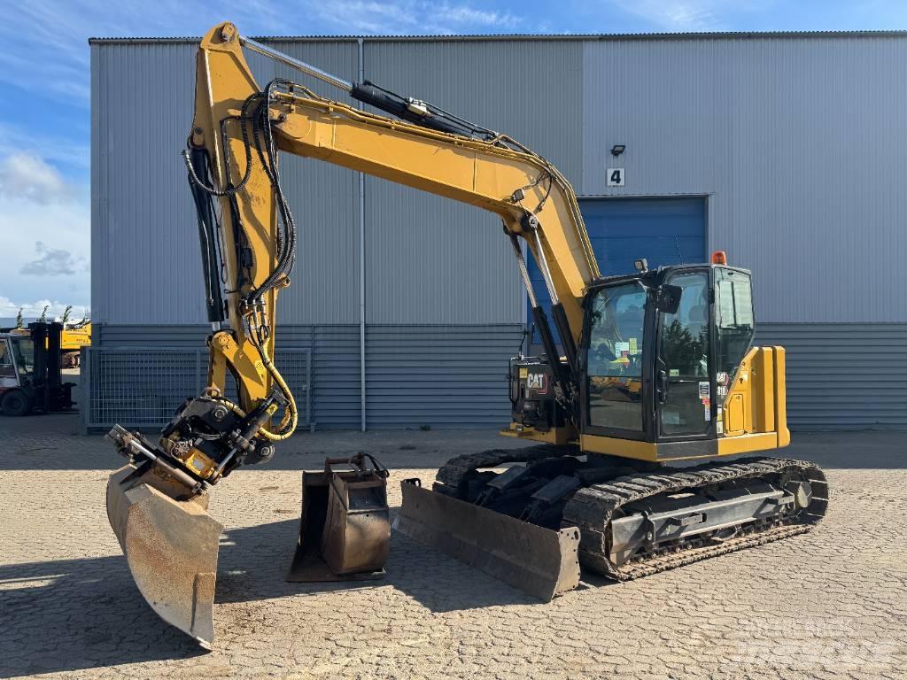 CAT 310 Pásová rýpadla