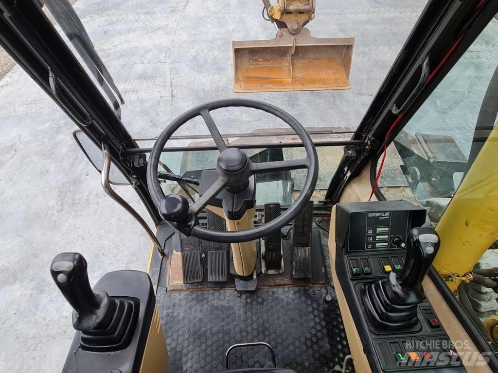 CAT M 312 Kolová rýpadla