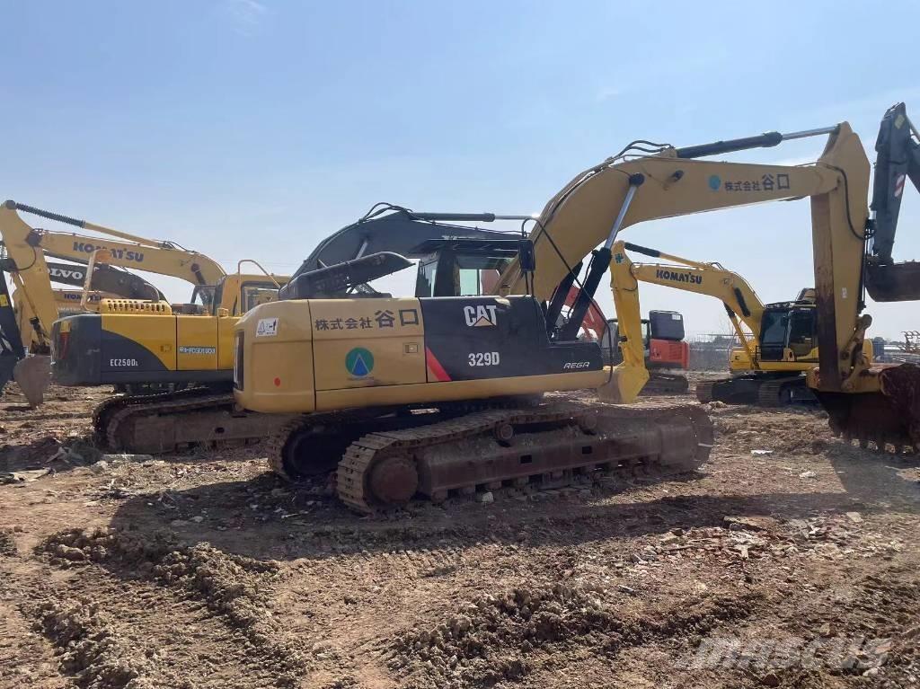 CAT 329D Rýpadla s dlouhým dosahem