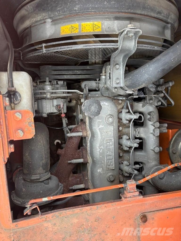 Hitachi EG 70 R Pásové dempry