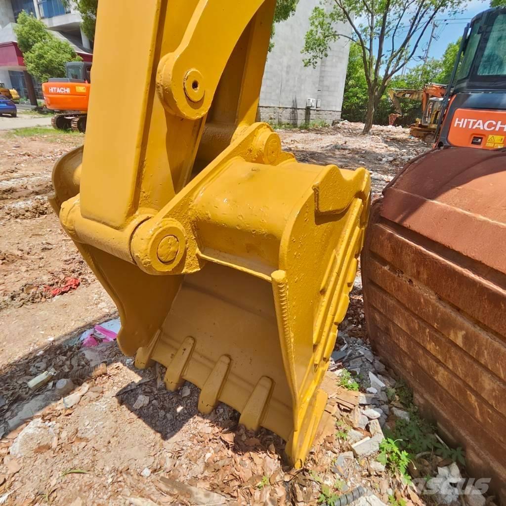 CAT 310 Pásová rýpadla