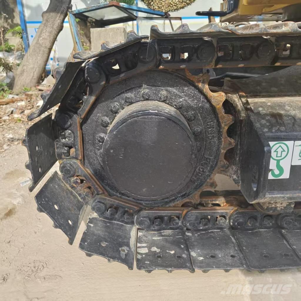CAT 310 Pásová rýpadla