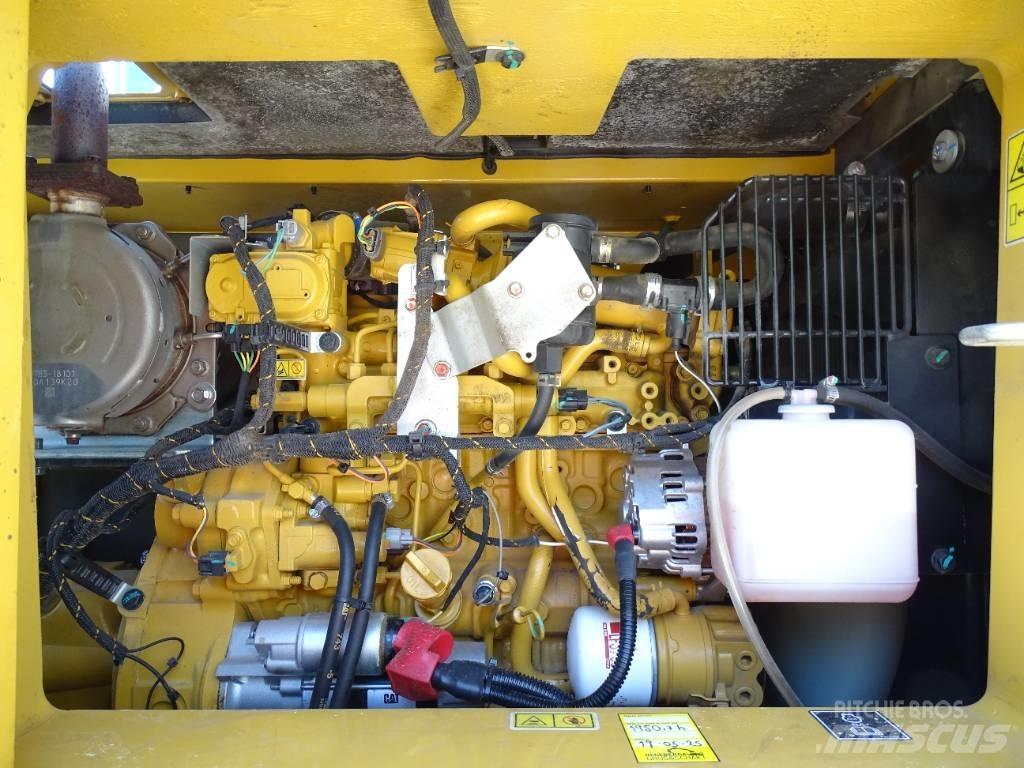 CAT 310 Pásová rýpadla
