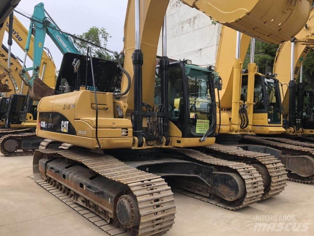 CAT 329 Pásová rýpadla