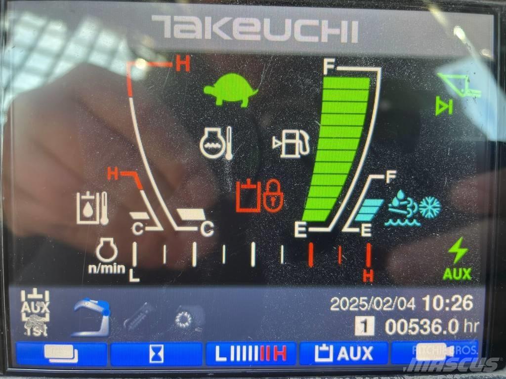 Takeuchi TL12 Smykem řízené nakladače