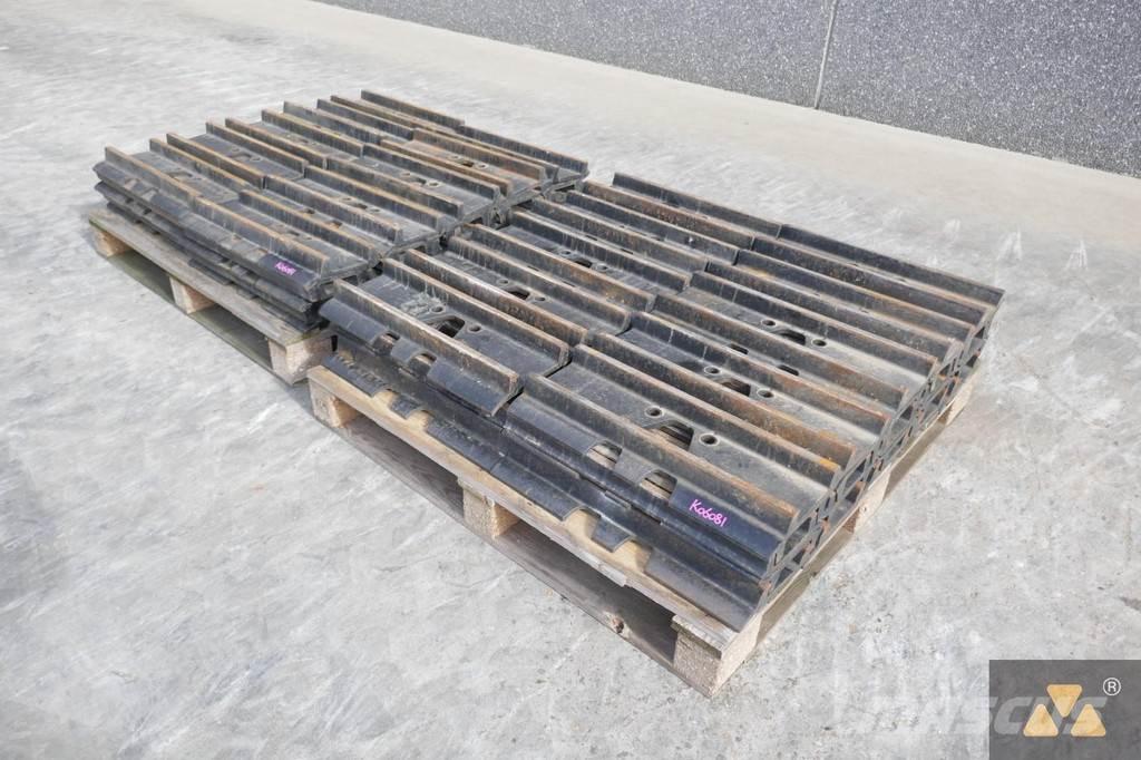 CAT 330 Trackshoes Pneumatiky, kola a ráfky