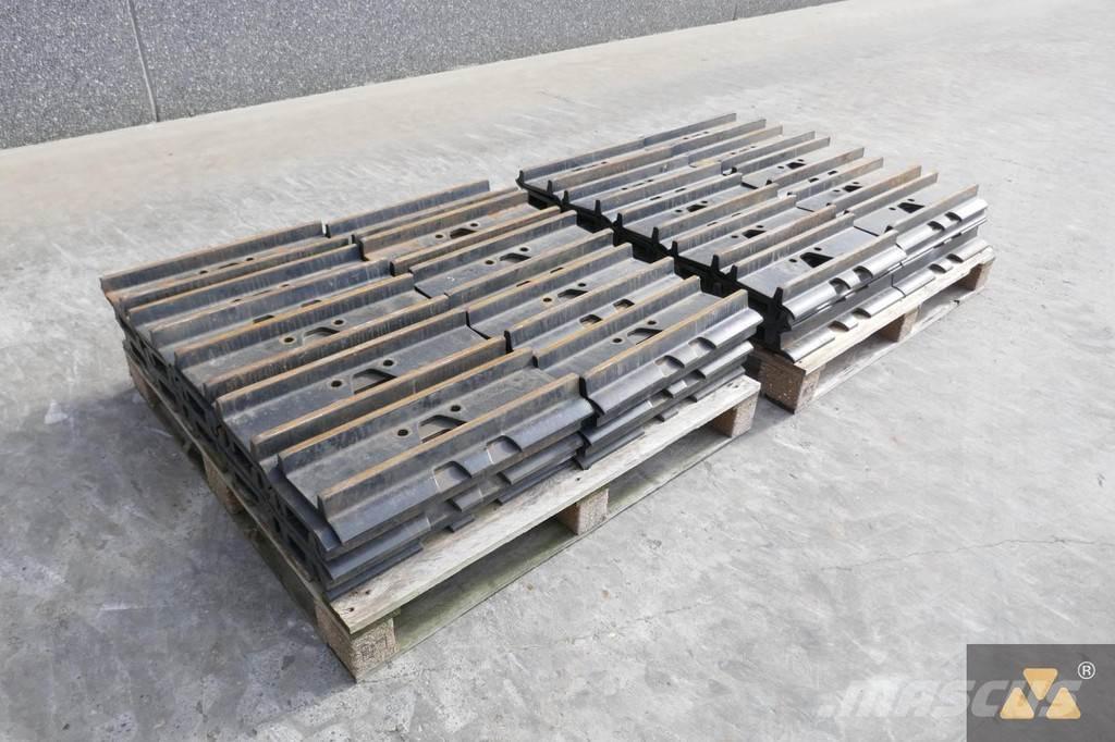 CAT 330 Trackshoes Pneumatiky, kola a ráfky