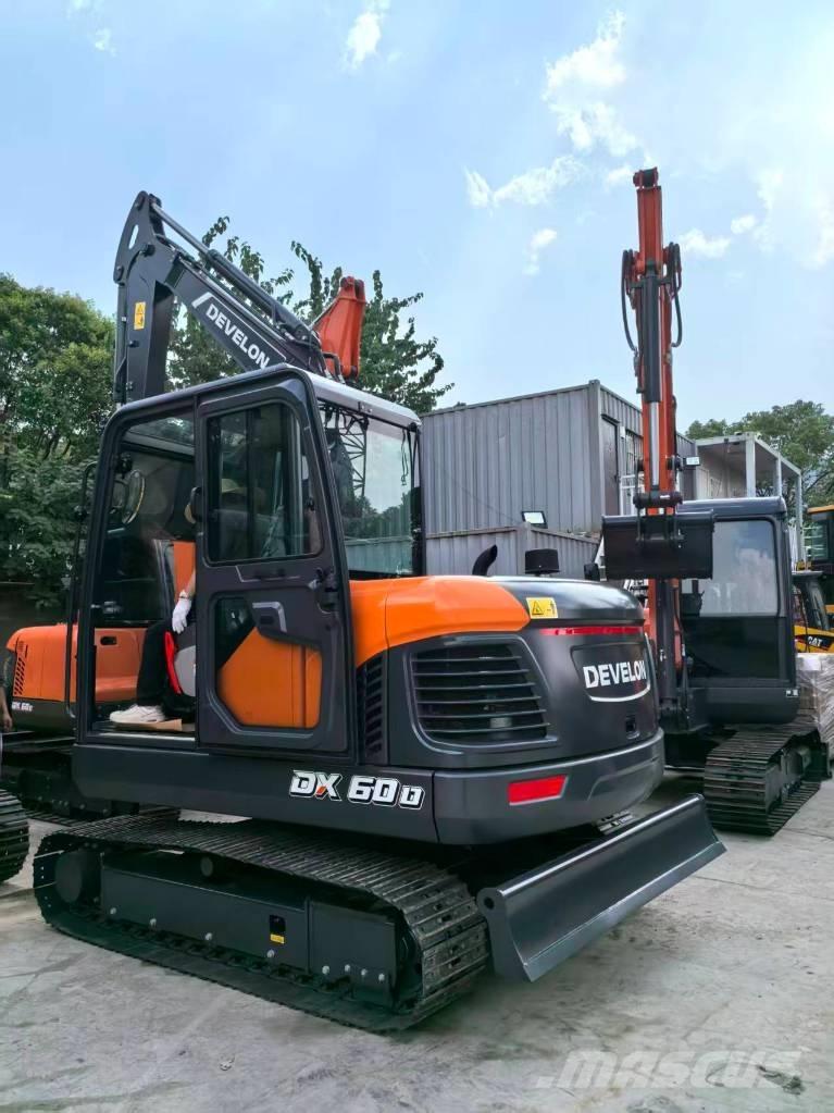 Develon DX 60 D Pásová rýpadla