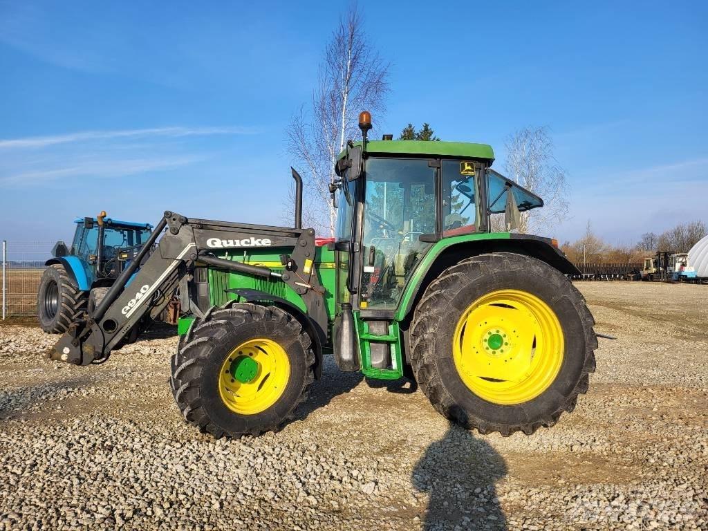 John Deere 6310 SE Traktory