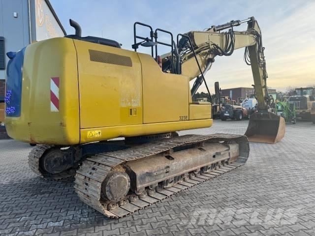 CAT 323 EL Pásová rýpadla