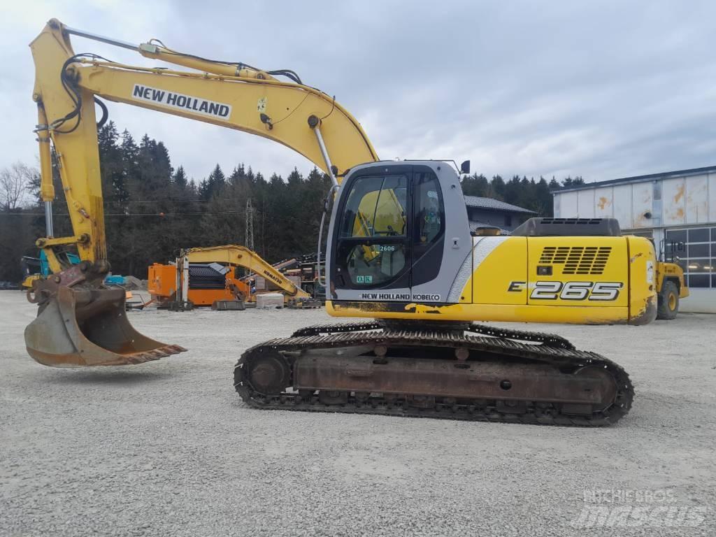 New Holland E 265 Pásová rýpadla