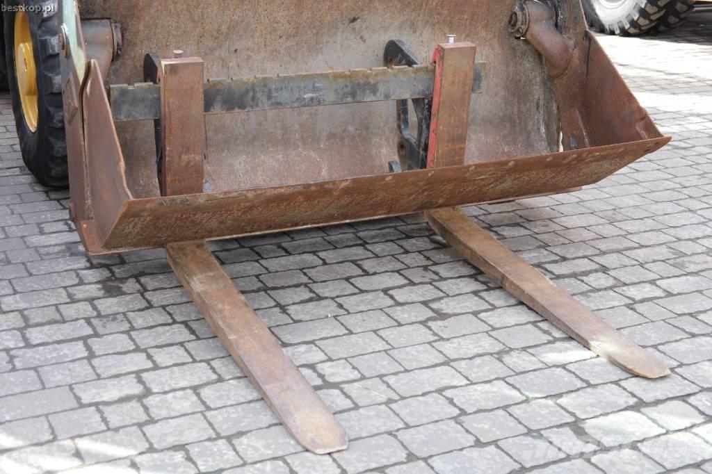 CAT 906M Kolové nakladače
