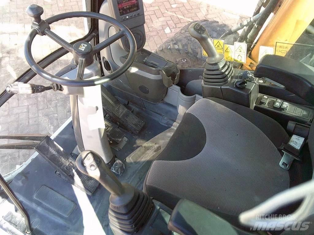 CAT M313D Kolová rýpadla