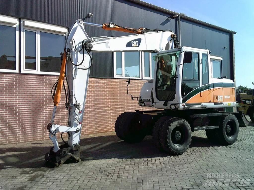 CAT M313D Kolová rýpadla