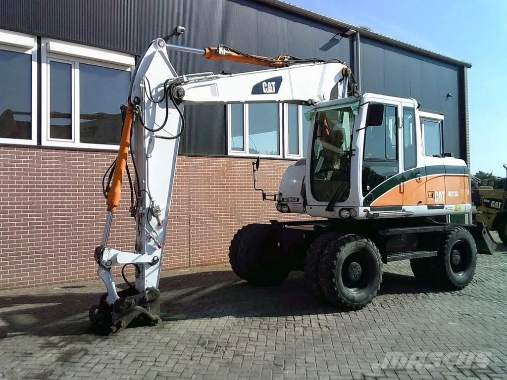 CAT M313D Kolová rýpadla