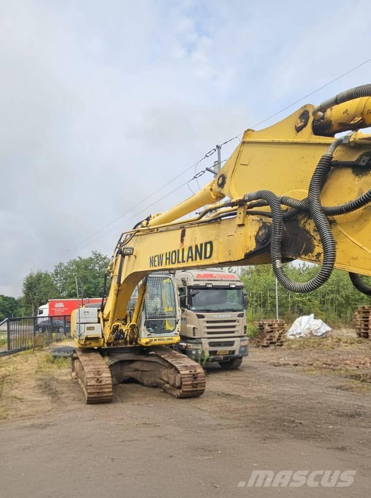 New Holland E 245 B Pásová rýpadla