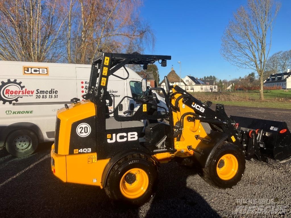 JCB 403 Smykem řízené nakladače