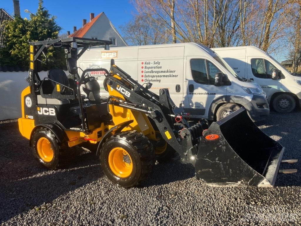 JCB 403 Smykem řízené nakladače
