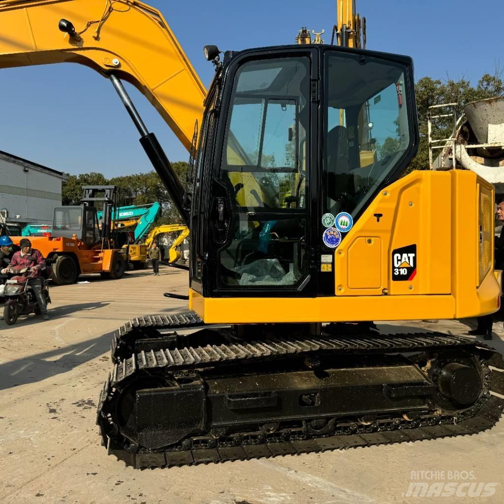CAT 310 Pásová rýpadla