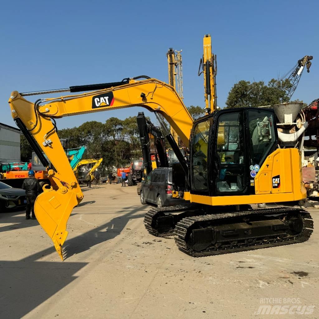 CAT 310 Pásová rýpadla