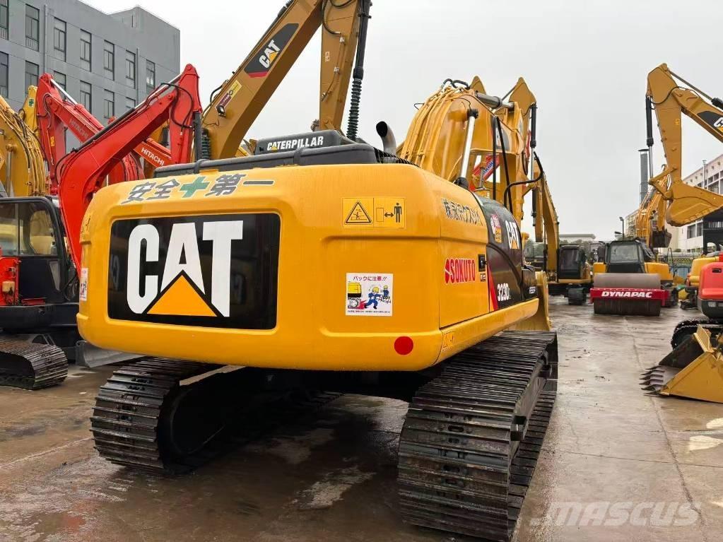 CAT 323 D Pásová rýpadla