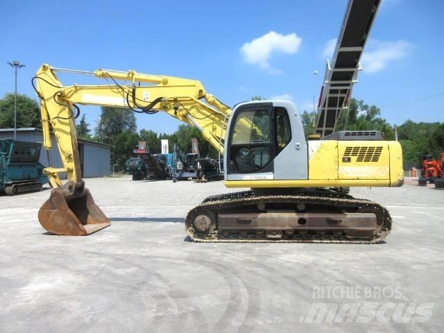 New Holland E 245 Pásová rýpadla